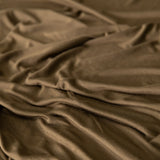 Close-up of crumpled brown jersey knit fabric