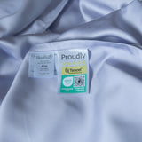 Silky fabric with a label indicating Tencel content