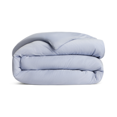 Folded light blue comforter png no background