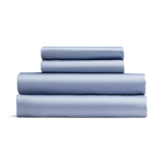 Set of light blue bed sheets stacked